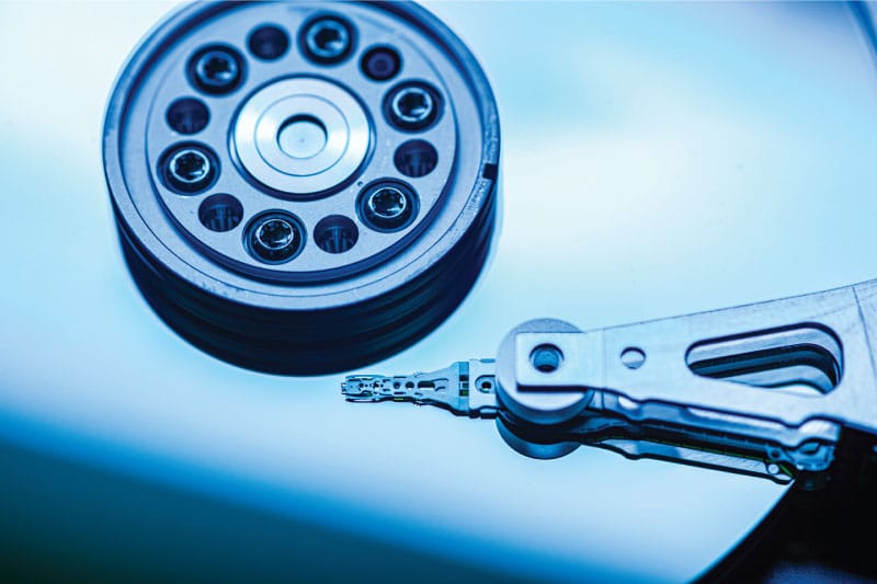 Expert Data Recovery Services for Hard Drives and Storage Devices Technician performing data recovery services on a damaged hard drive, ensuring critical files are retrieved safely and efficiently.